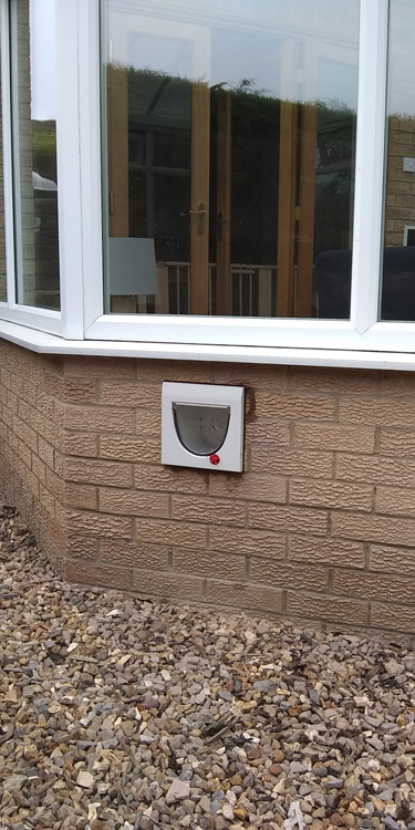 Cat flap fitted through the wall Northumberland (Hexham)