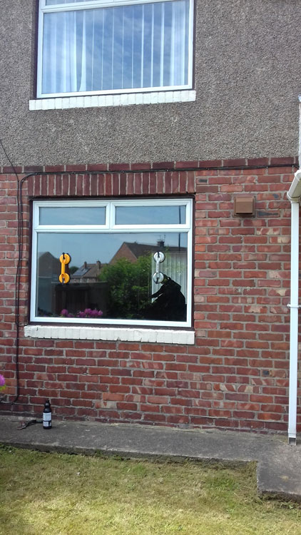 Glazier to remove glass for furniture delivery North East