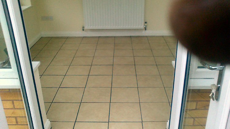completed sunroom floor tiling